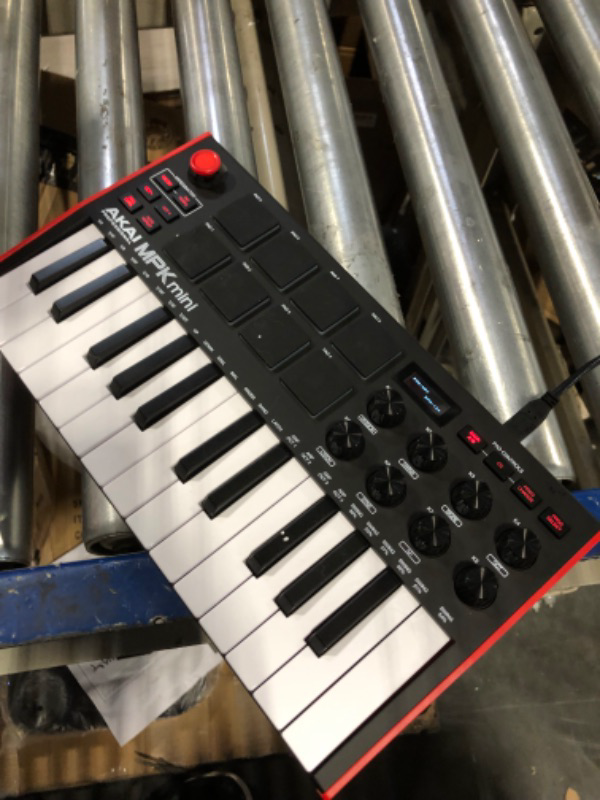 Photo 3 of AKAI Professional MPK Mini MK3 - 25 Key USB MIDI Keyboard Controller With 8 Backlit Drum Pads, 8 Knobs and Music Production Software Included
