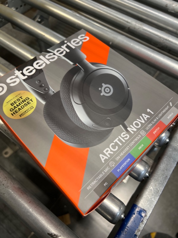 Photo 2 of NEW SteelSeries Arctis Nova 1 Multi-System Gaming Headset — Hi-Fi Drivers — 360° Spatial Audio — Comfort Design — Durable — Ultra Lightweight — Noise-Cancelling Mic — PC, PS5/PS4, Switch, Xbox - Black Black Wired Arctis Nova 1 Headset