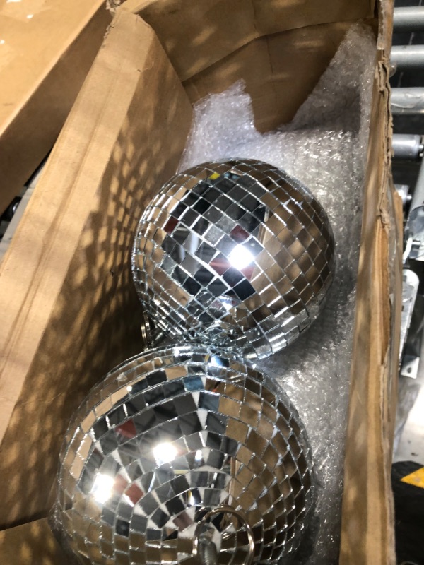 Photo 3 of 4 Pack Large Disco Ball Silver Hanging Disco Balls Reflective Mirror Ball Ornament for Party Holiday Wedding Dance and Music Festivals Decor Club Stage Props DJ Decoration (6 Inch, 8 Inch)
