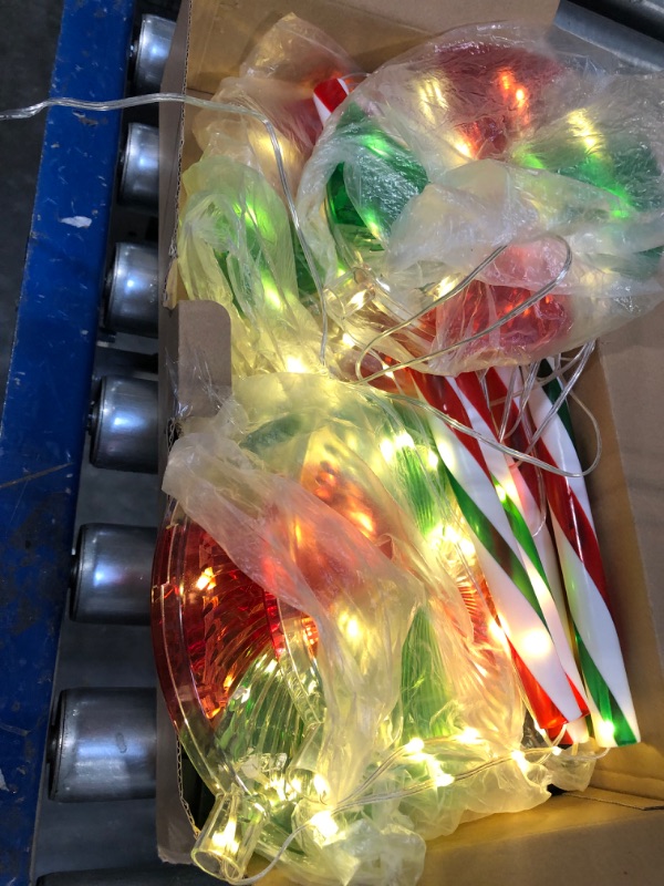 Photo 3 of 4 Pack 27.5" Lollipop Peppermint Christmas Pathway Lights Outdoor with Bows, Green Red White 80 LED Candy Cane Lights 8 Modes Timer Waterproof, Walkway Markers for Xmas Outsides Garden Yard Decoration Style 1 - Green Red White