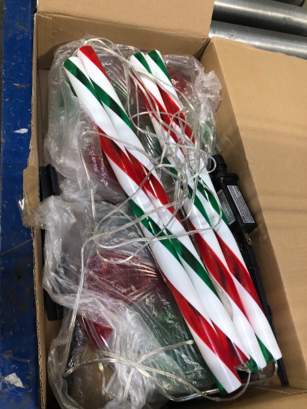 Photo 2 of 4 Pack 27.5" Lollipop Peppermint Christmas Pathway Lights Outdoor with Bows, Green Red White 80 LED Candy Cane Lights 8 Modes Timer Waterproof, Walkway Markers for Xmas Outsides Garden Yard Decoration Style 1 - Green Red White