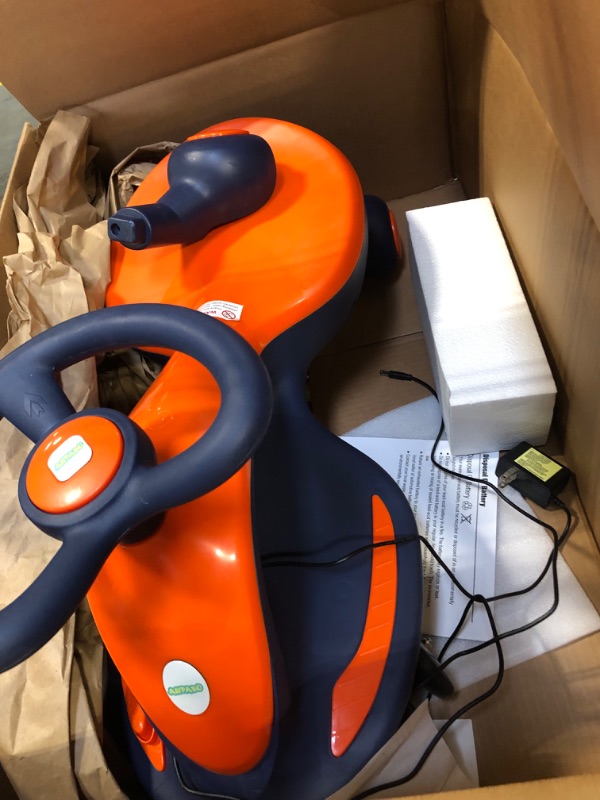 Photo 1 of Electric Wiggle Car Ride On Toy, ANPABO 2 in 1 Wiggle Car with Rechargable Battery and Pedal, Anti-Rollover Wheels with Colorful Lights, Swing Car for Toddlers and Kids Age 3 Year up Orange