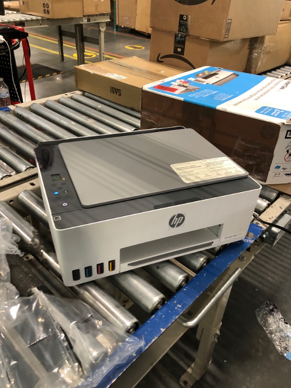 Photo 1 of HP Smart -Tank 5101 Wireless Cartridge-free all in one printer, up to 2 years of ink included, mobile print, scan, copy (1F3Y0A) , White
**black ink spilled on the printer***
