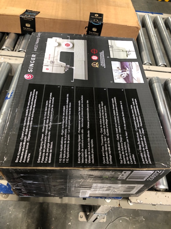 Photo 1 of SINGER | Heavy Duty 4452 Sewing Machine Sewing Machine + Tote