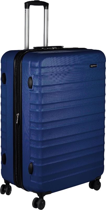 Photo 1 of Amazon Basics 24-Inch Hardside Spinner, Navy Blue
