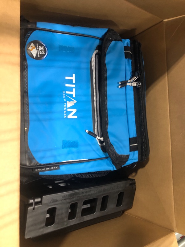 Photo 1 of Arctic Zone Titan Deep Freeze 60 (50+10) Can Collapsible Rolling Cooler with Wheels and All-Terrain Cart Process Blue
