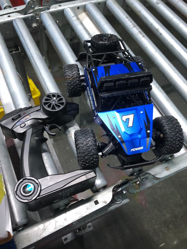 Photo 4 of BEZGAR TB141 RC Cars-1:14 Scale Remote Control Car, 2WD High Speed 20 Km/h All Terrains Electric Toy Off Road RC Car Vehicle Truck Crawler with Two Rechargeable Batteries for Boys Kids and Adults Blue 1:14 Scale