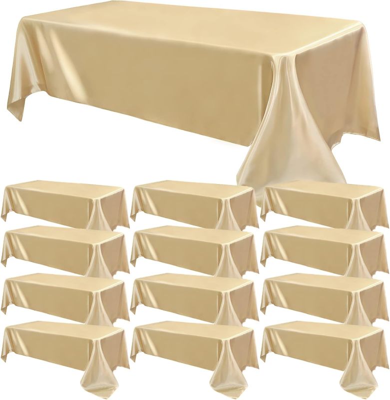 Photo 1 of 12 Pack Satin Tablecloth Wedding Rectangle Tablecloth Bright Silk Tablecloth Smooth Table Overlay Cover for Wedding Banquet Party Birthday Events Celebration Table Decoration(57"x108",Champagne)