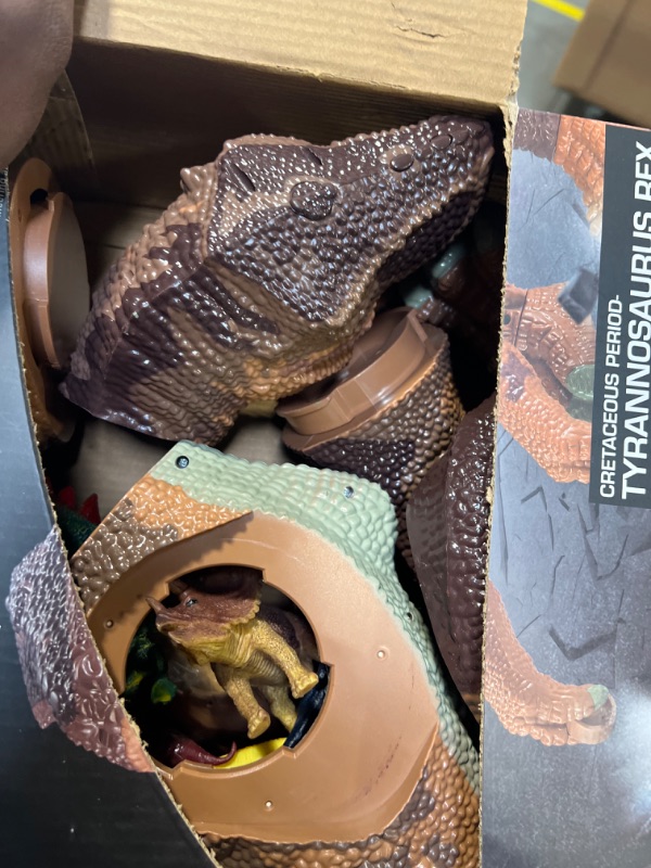 Photo 3 of TEMI Large Dinosaur Toys for Kids 3-5, Jumbo Tyrannosaurus Rex with Mist Spray, Light and Sounds, One Big Hollow T-rex Stored with 4 Hand-Painted Dinosaurs and 6 Mini Dinos Brown