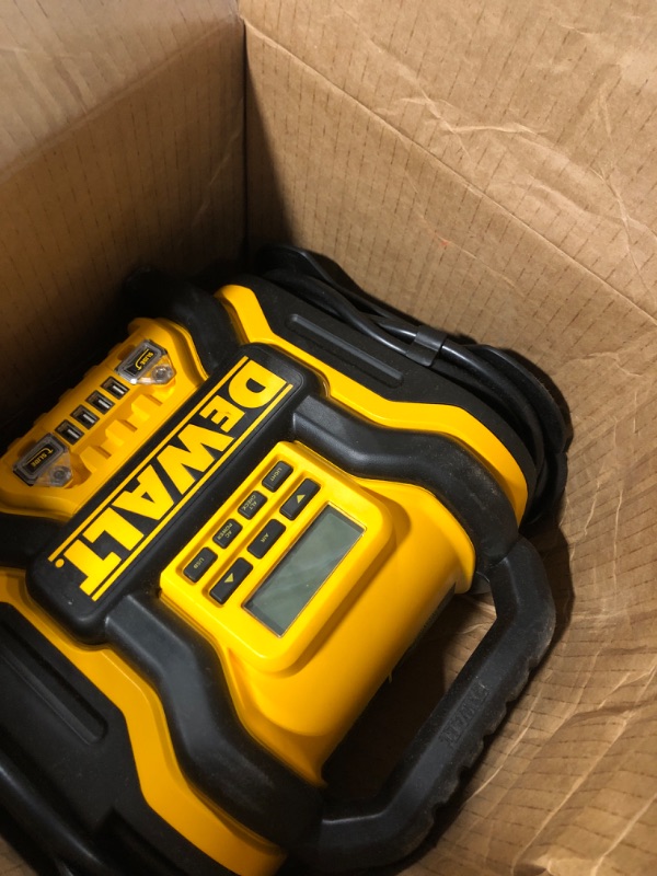 Photo 3 of DEWALT DXAEPS14 1600 Peak Battery Amp 12V Automotive Jump Starter/Power Station with 500 Watt AC Power Inverter, 120 PSI Digital Compressor, and USB Power , Yellow