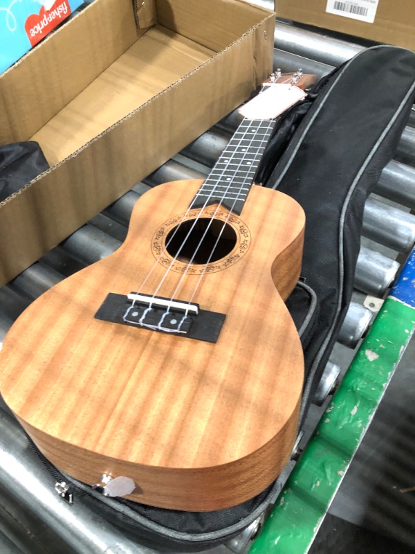 Photo 4 of AODSK Concert Ukulele for Beginners Kit for Kid Adult Student, Sapele Hawaiian Starter Uke Kids Guitar Ukalalee with Gig Bag and Ukulele Accessories (AUC-P08 23 Inch Sapele Concert) Concert AUC-P08 Sapele Ukulele