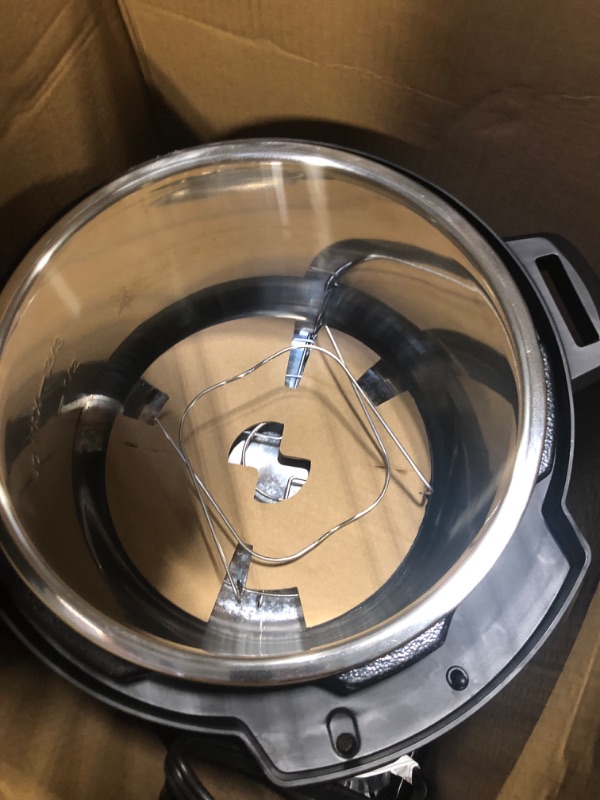 Photo 4 of **USED Damaged, Does Not Sit Flat** Instant Pot Duo 7-in-1 Electric Pressure Cooker, Slow Cooker, Rice Cooker, Steamer, Sauté, Yogurt Maker, Warmer & Sterilizer, Includes App With Over 800 Recipes, Stainless Steel, 8 Quart 8QT Duo