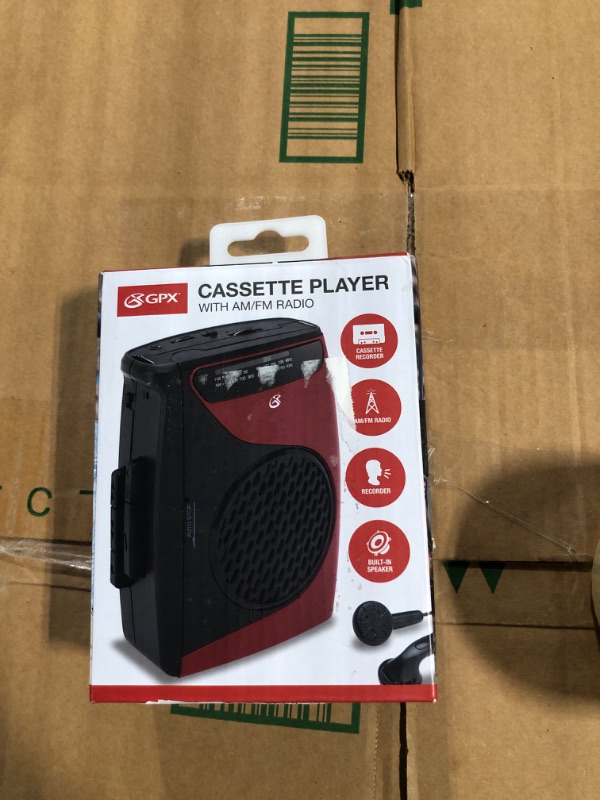 Photo 2 of GPX Portable Cassette Player, 3.54 x 1.57 x 4.72 Inches, Requires 2 AA Batteries - Not Included, Red/Black (CAS337B) Black/Red