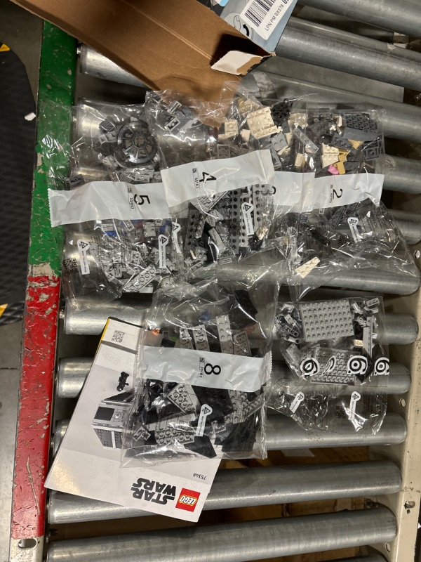 Photo 1 of LEGO Star Wars Mandalorian Fang Fighter vs. TIE Interceptor 75348 Building Toy Set, Perfect Star Wars Gift for Fans Aged 9 and Up; with 3 Characters Including The Mandalorian
*missing packs 1 and 7*