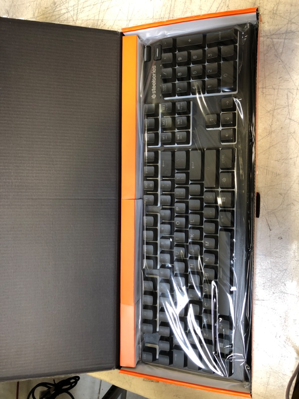 Photo 1 of SteelSeries Apex 3 RGB Gaming Keyboard – 10-Zone RGB Illumination – IP32 Water Resistant – Premium Magnetic Wrist Rest (Whisper Quiet Gaming Switch)
