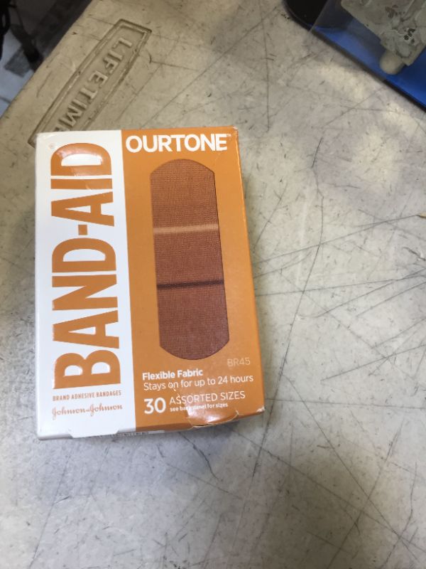 Photo 2 of Band-Aid Brand Ourtone Flexible Fabric Adhesive Bandages Flexible Protection Care of Minor Cuts Scrapes QuiltAid Pad for Painful Wounds Assorted Sizes, Br45, 30 Count Br45 30 Piece Assortment
