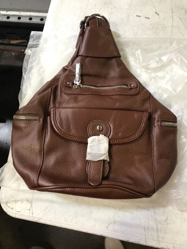 Photo 1 of CROSSBODY SLING BAG  BROWN