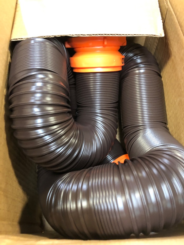 Photo 3 of Camco RhinoFLEX RV Sewer Hose Kit with Swivel Transparent Elbow and 4-in-1 Dump Station Fitting, Brown, 15 Feet (39770) 15ft Sewer Hose Kit Frustration-Free Packaging