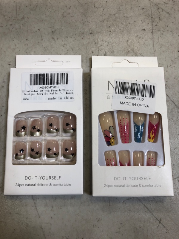 Photo 1 of 2 packs of press on nails