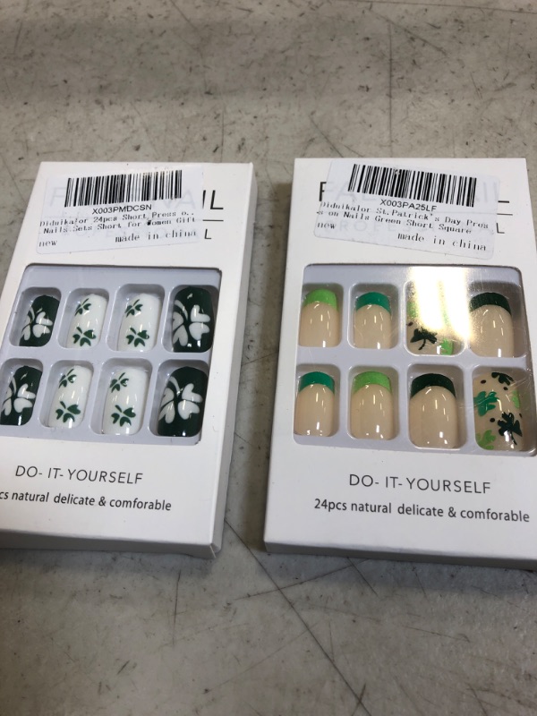 Photo 1 of 2 packs of press on nails