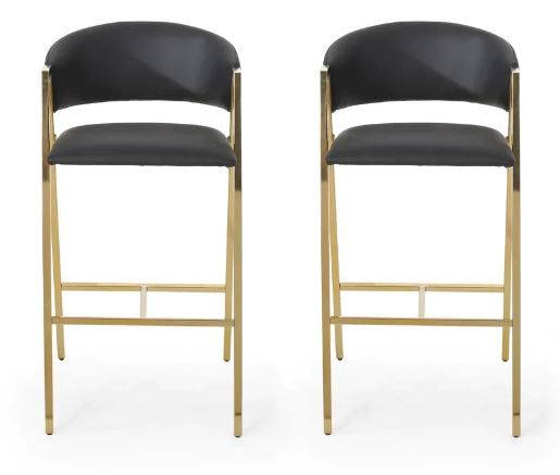 Photo 1 of Kenia Modern Faux Leather Barstool (Set of 2)Includes: Two (2) Barstools
Material: Faux Leather
Leg Material: Iron
Finish: Black
Leg Finish Gold

Dimensions: 22.00 inches deep x 19.00 inches wide x 38.00 inches high
Seat Dimensions: 16.00 inches deep x 17