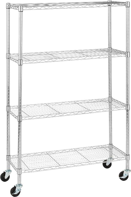 Photo 1 of Amazon Basics 4-Shelf Adjustable, Heavy Duty Storage Shelving Unit on 3'' Wheel Casters, Metal Organizer Wire Rack, Chrome, 36" L x 14" W x 57.8" H
