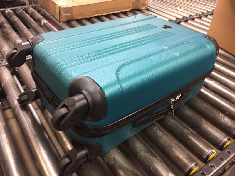 Photo 1 of green luggage 