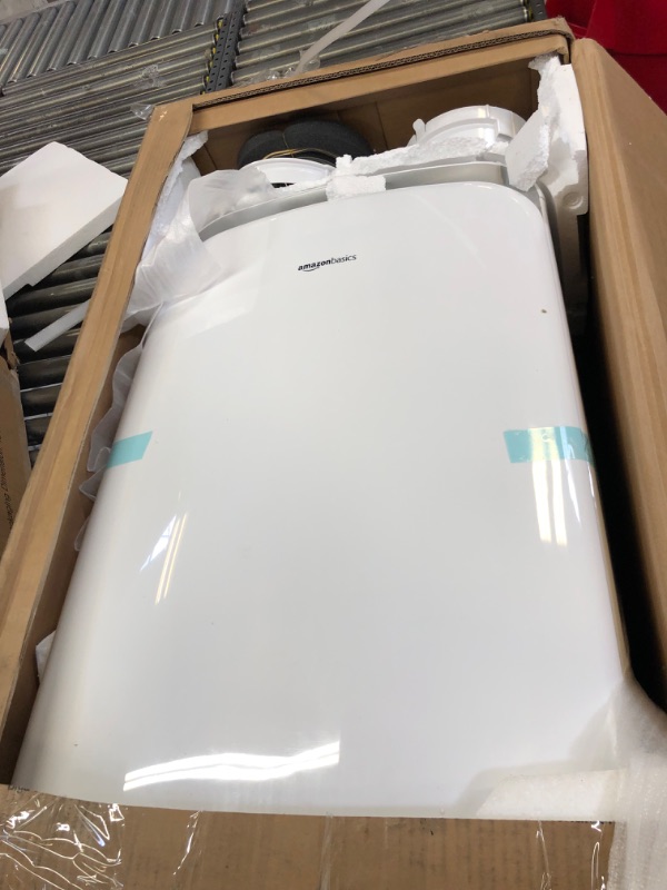 Photo 1 of Amazon Basics Portable Air Conditioner with Heat Pump - Cools 550 Square Feet, 13,000 BTU ASHARE / 10,000 BTU SACC 10,000 BTU Single Hose with Heat Pump