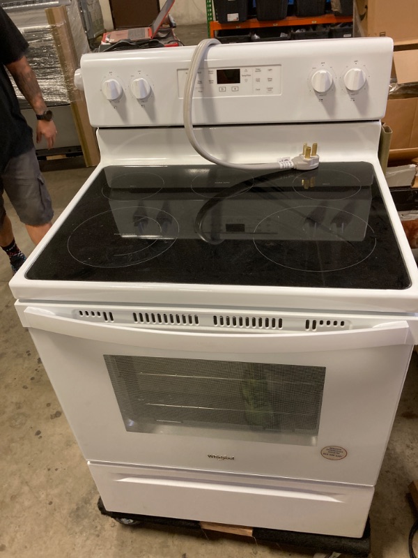 Photo 2 of 5.3 cu. ft. Electric Range with Steam Clean and 5 Elements in White
