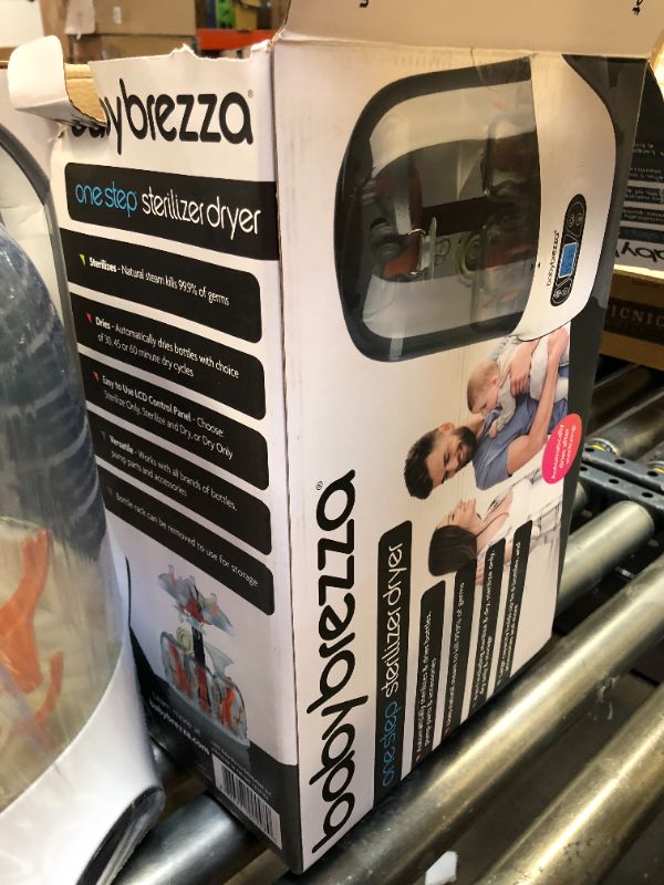 Photo 1 of Baby Brezza Baby Bottle Sterilizer and Dryer Machine – Electric Steam Sterilization - Universal Fit - Pacifiers, Glass, Plastic, and Newborn Feeding Bottles