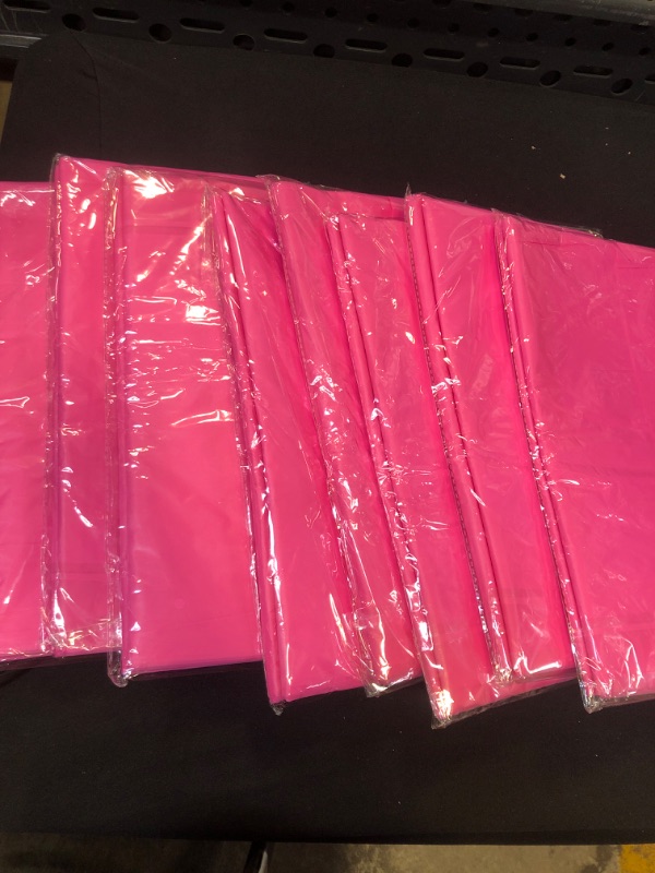 Photo 1 of 8PK PINK DISPOSABLE PLASTIC TABLECLOTH SIZE UNKNOWN