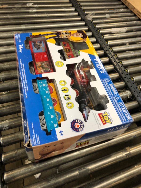 Photo 2 of Lionel Disney Pixar's Toy Story Ready-to-Play Battery Powered Model Train Set with Remote Ready to Play Set ~ FACTORY SEALED ~