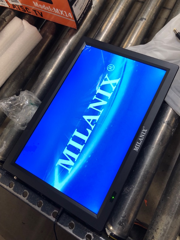 Photo 4 of Milanix 14.1" Portable Widescreen LED TV with HDMI VGA MMC FM Usb/sd Card Slot Built in Digital Tuner AV Inputs and Remote Control