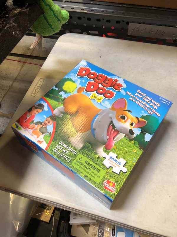 Photo 2 of Doggie Doo Corgi Game - Unpredictable Action - Feed The Doggie and Collect His Doo to Win - Includes 24-Piece Puzzle by Goliath