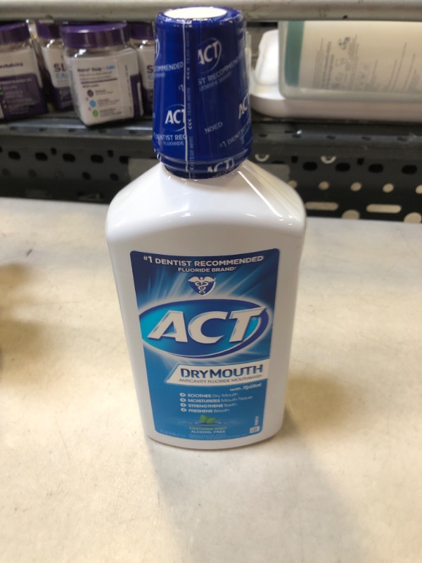 Photo 2 of ACT Dry Mouth Anticavity Zero Alcohol Fluoride Mouthwash, Soothing Mint, 33.8 fl. oz. 33.8 Fl Oz (Pack of 1)