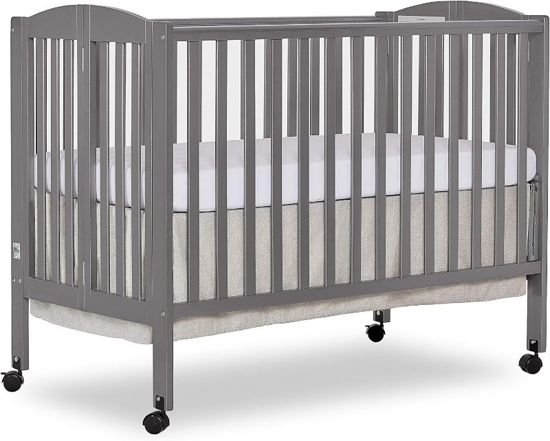 Photo 1 of Dream On Me Full Size 2-in-1 Folding Stationary Side Crib in Steel Grey, Locking Wheels, Folds Flat for Storage, Comes with Teething Guard, Non-Toxic Finish
