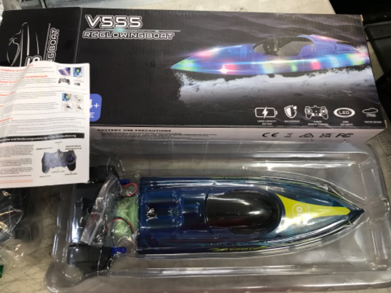 Photo 1 of Akargol RC Boat with LED Light for Kids and Adults - Remote Control Boat for Pools and Lakes 2.4 GHZ RC Boats with 2 Rechargeable Battery