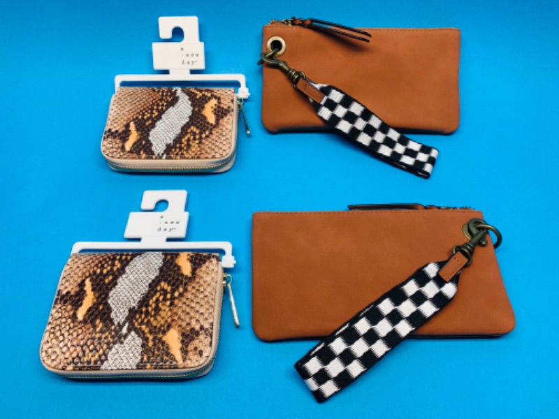 Photo 1 of 985122… 2 wristlets  and 2 change purses 