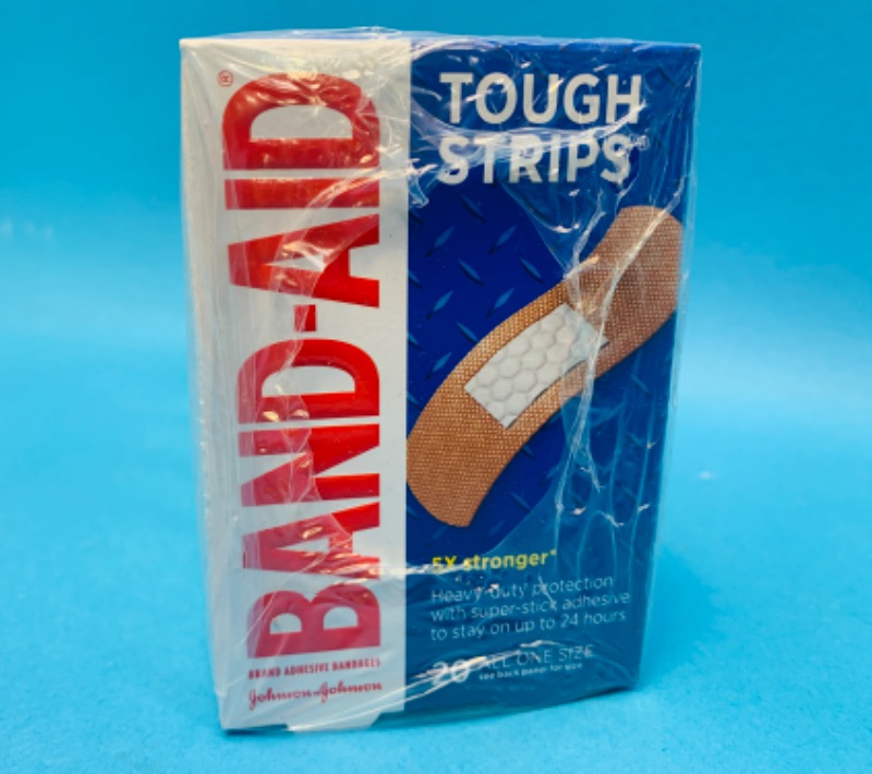 Photo 2 of 985344…6 boxes of tough strips bandaids 5x stronger 20 per box