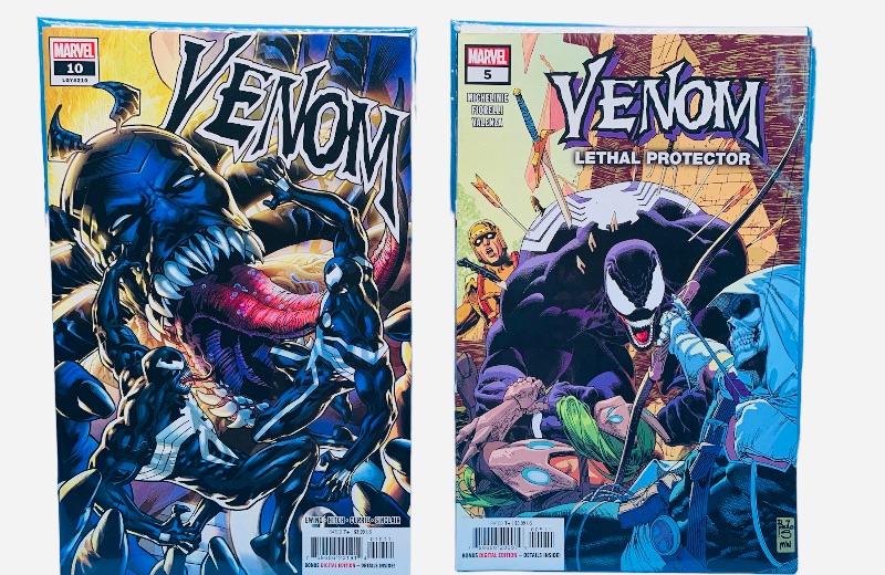 Photo 1 of 985487…2 venom  comics in plastic sleeves 
