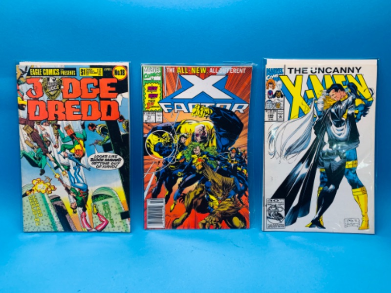 Photo 1 of 985497…  3 comics in plastic sleeves 