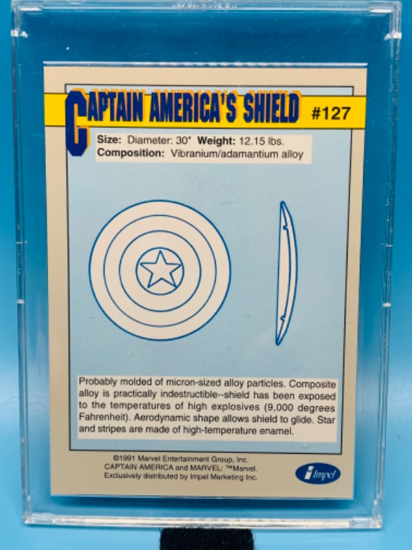 Photo 2 of 985529…1991 marvel weapons captain America’s shield card 127  in hard plastic case 