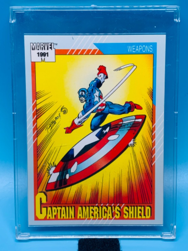 Photo 1 of 985529…1991 marvel weapons captain America’s shield card 127  in hard plastic case 