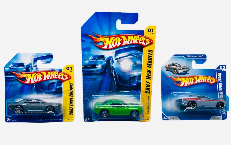 Photo 1 of 985549… 3 hot wheels die cast dodge challenger cars