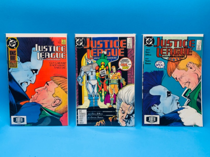 Photo 1 of 985741…3 vintage justice league international  comics in plastic sleeves 