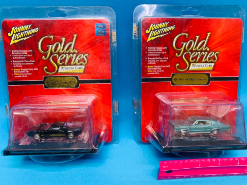 Photo 1 of 985770…2  Johnny Lightning die cast Gold Series muscle cars 