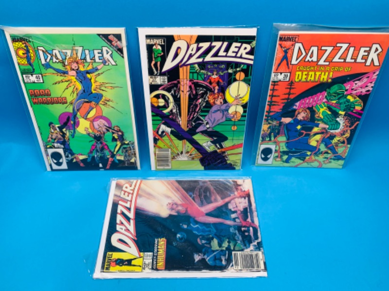 Photo 1 of 985815…4 vintage Dazzler comics in plastic sleeves 