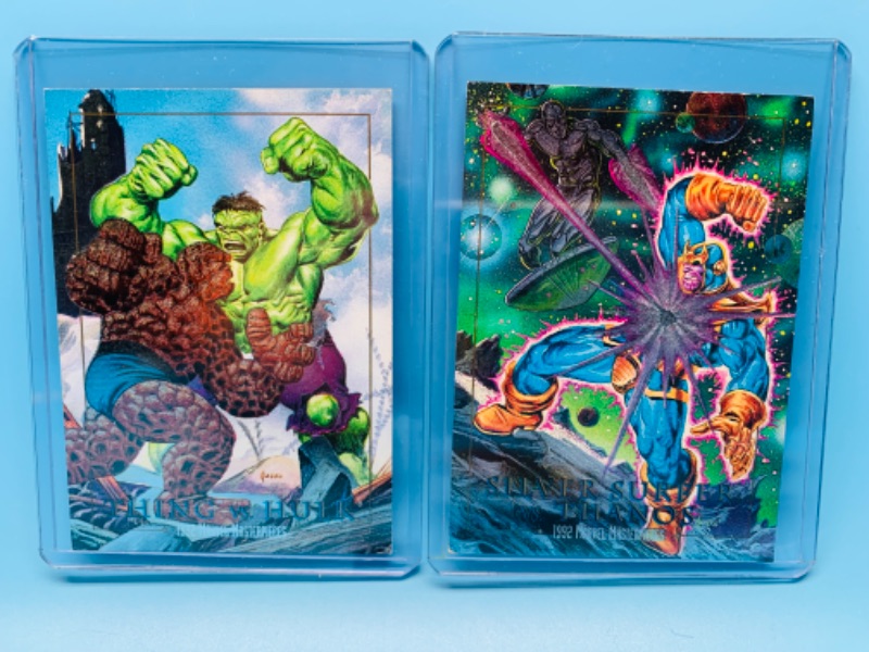 Photo 1 of 985847…1992 Thing vs. Hulk and Silver Surfer vs. Thanos cards in hard plastic sleeves 