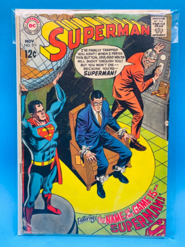 Photo 1 of 985951…vintage $.12 cent Superman comic 211 in plastic sleeve- wear, folds, creases 