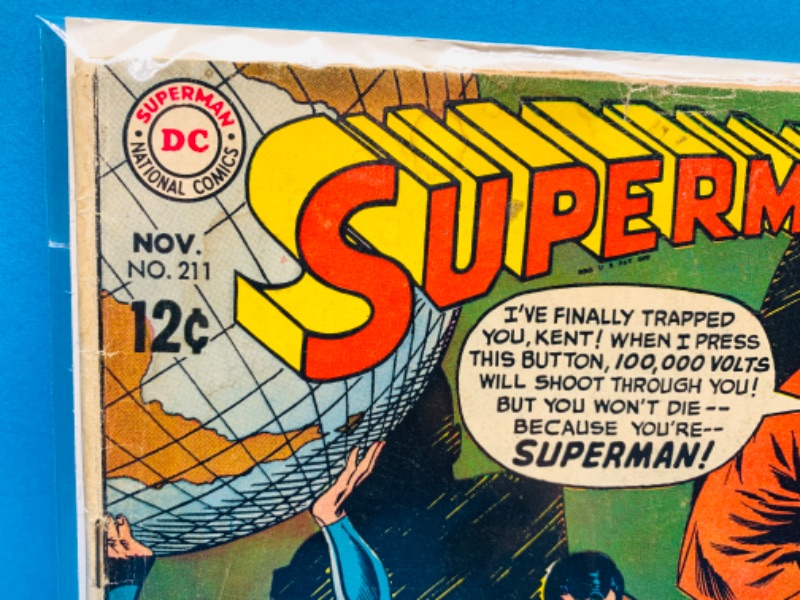 Photo 6 of 985951…vintage $.12 cent Superman comic 211 in plastic sleeve- wear, folds, creases 